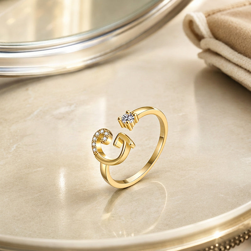 Anello regolabile con iniziale brillante per donna