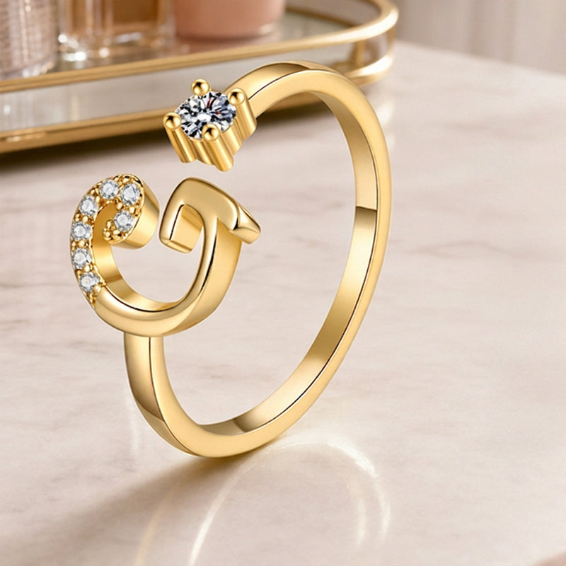 Anello regolabile con iniziale brillante per donna