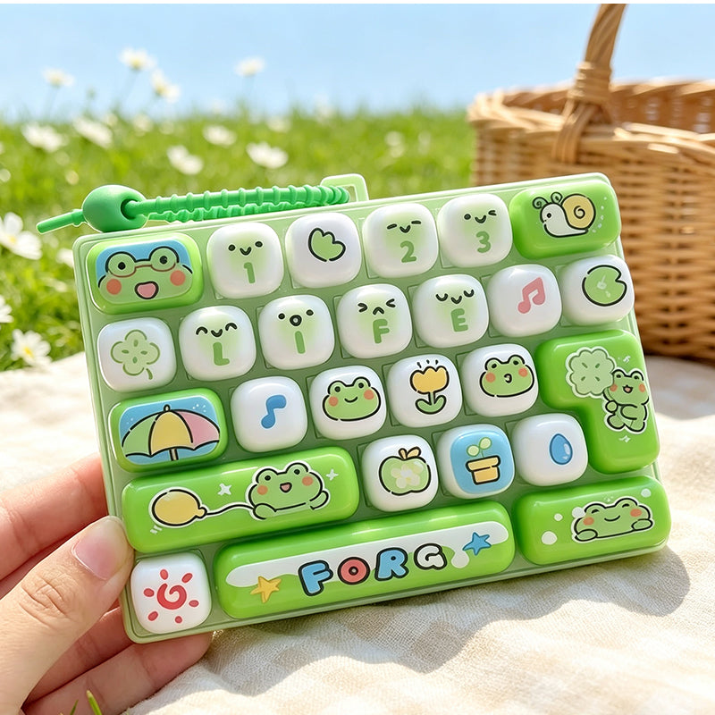⌨️Portachiavi Tastiera Fidget 🎮🐰🎒 Con 26 tasti dalla piacevole pressione, design animale cartoon e formato portachiavi compatto, si aggancia a borse e zaini per offrire stimolazione tattile alle dita durante le pause lavorative.✨